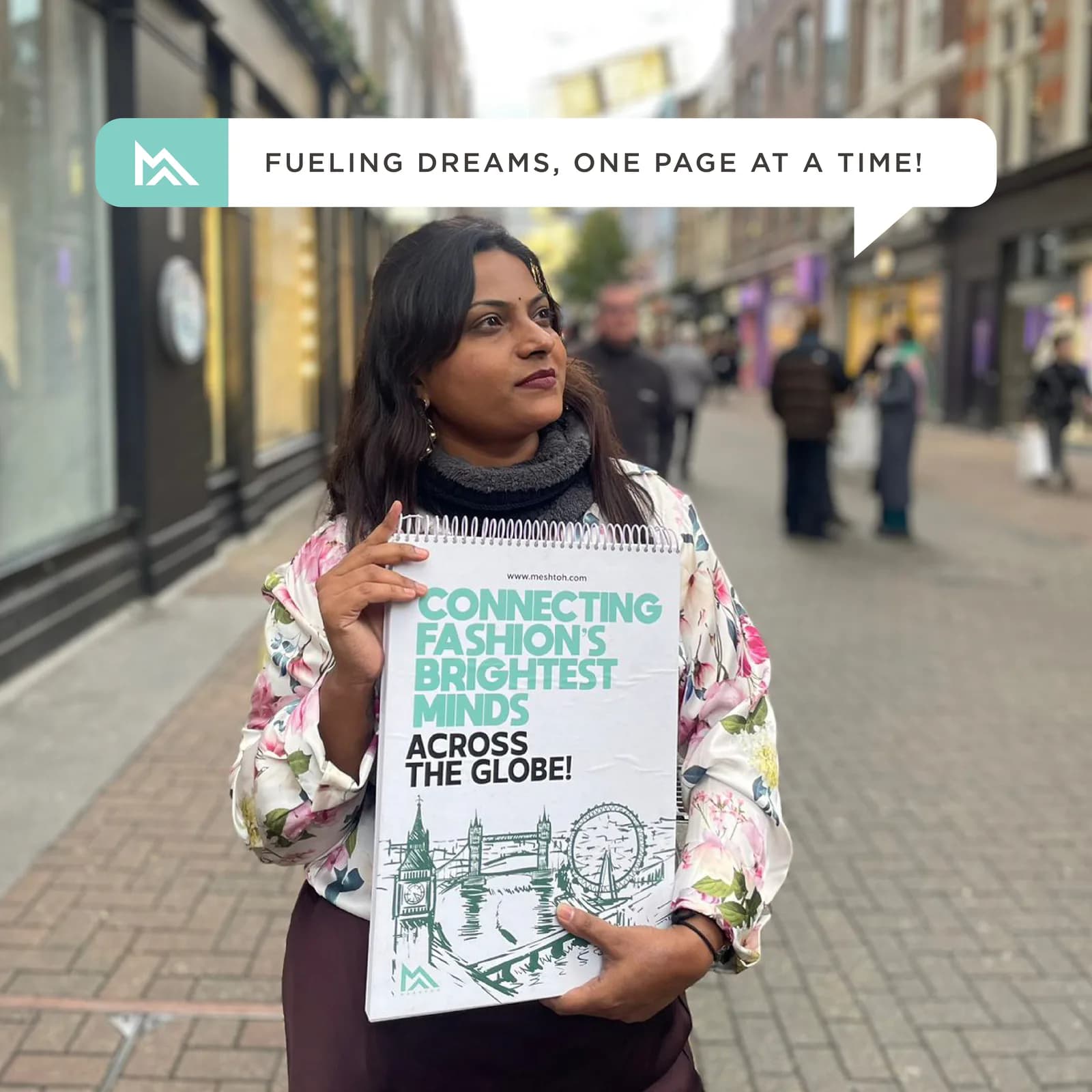 Campaign frame of a participant holding branded collateral on a London street